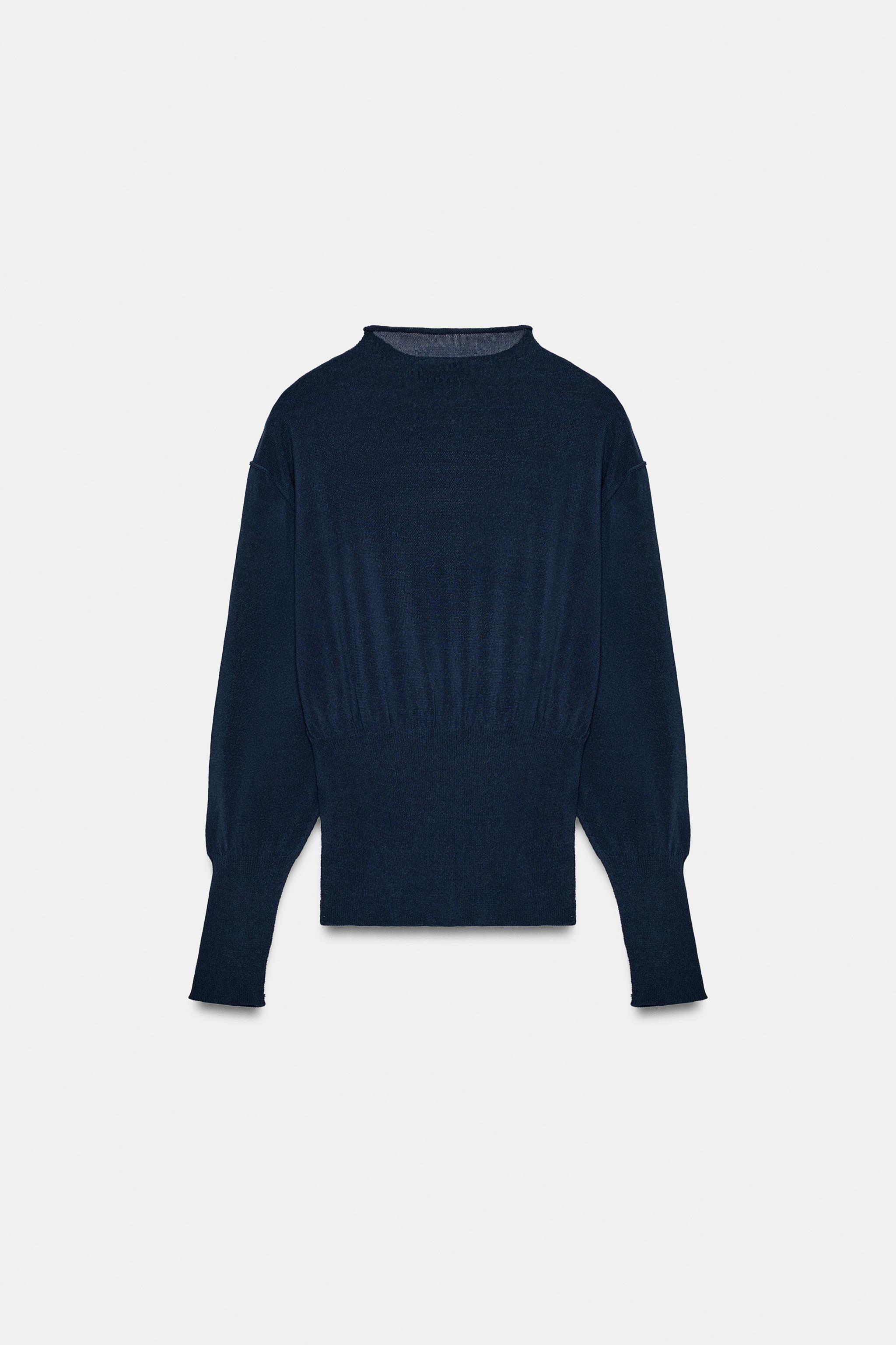 PULL EN MAILLE AVEC TAILLE LARGE